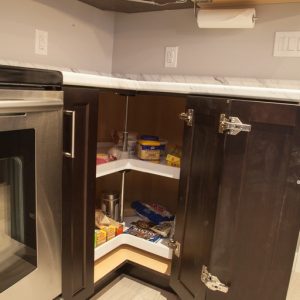 Lazy Susan. Even if you love them or hate them you can't argue with the ease of access a lazy susan offers. Both shelves rotate independently.