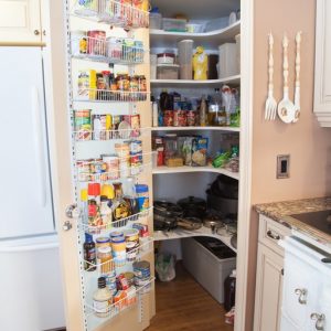 Corner pantry shelves. This creates tons of storage for all those cans, boxes, little used appliances and any other thing you can think of!