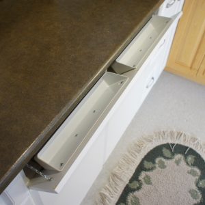 Tilt out trays. Perfect for under a sink where there isn't much usable space.